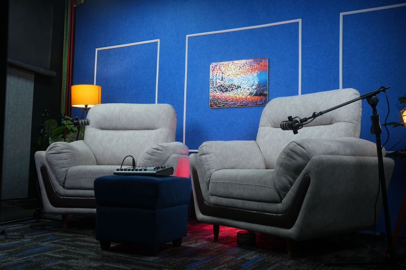 Two-seat podcast set with boom microphones
